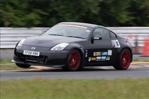Glen Shaw 'three wheels'through The Wiggler (Hedley Bennett)
